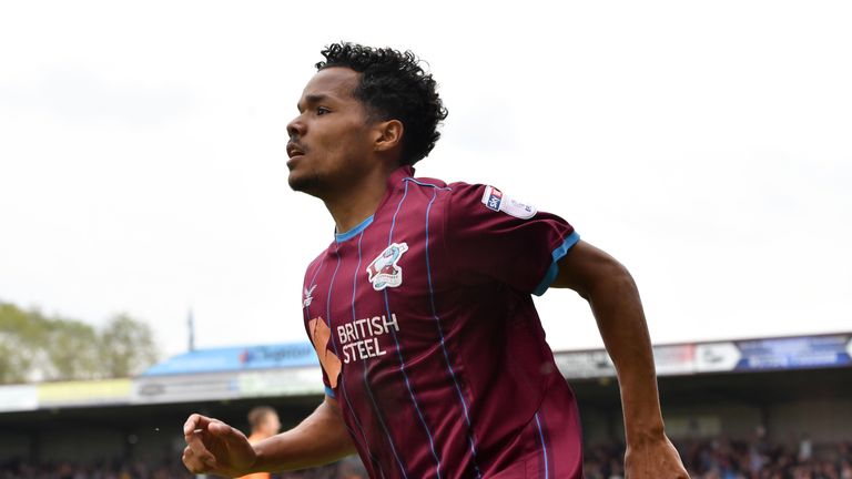 Scunthorpe United's Duane Holmes celebrates after Rotherham United's Michael Ihiekwe scores an own goal