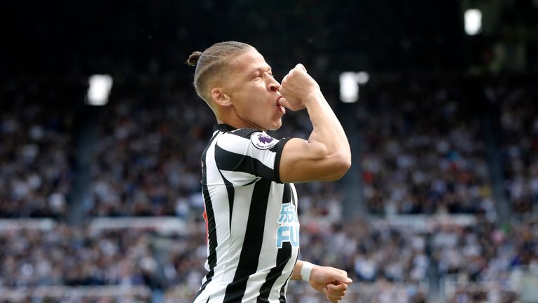 Dwight Gayle celebrates after giving Newcastle the lead
