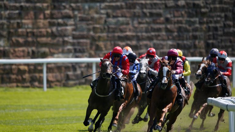 CHESTER, ENGLAND - MAY 10: Jason Hart riding El Astronaute (R, maroon) win The Boodles Diamond Handicap Stakes at Chester Racecourse on May 10, 2017 in Chester, England. (Photo by Alan Crowhurst/Getty Images) *** Local Caption *** Jason Hart;El Astronaute