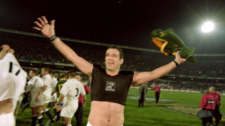 Martin Johnson celebrates England's victory over South Africa in Bloemfontein