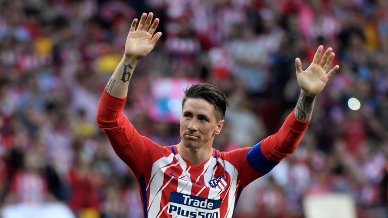 Fernando Torres salutes the fans following his final appearance for Atletico Madrid