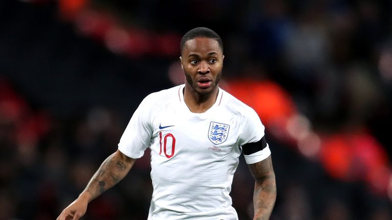 Previously unreleased photo dated 28/05/2018 of England's Raheem Sterling  (back to camera) visibly showing a tattoo on his leg during a training  session at St George's Park, Burton Stock Photo - Alamy