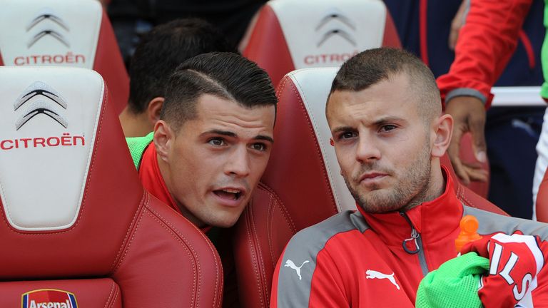 Jack Wilshere and Granit xhaka during the Premier League match between XXX and XXX at Emirates Stadium on August 14, 2016 in London, England.