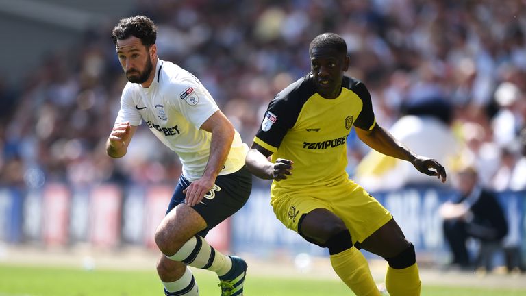 Greg Cunningham is put under pressure by Marvin Sordell during the Sky Bet Championship match between Preston North End and Burton Albion at Deepdale on May 6, 2018