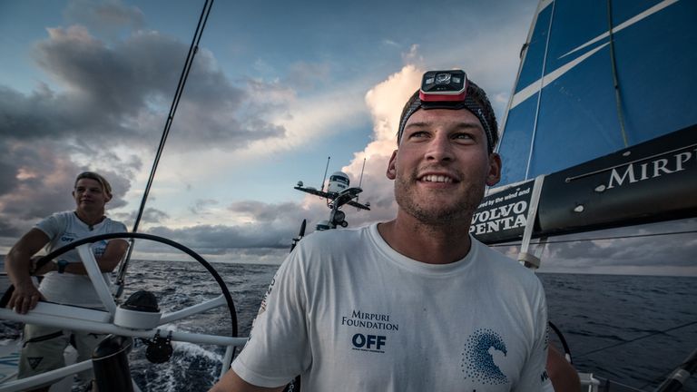 Leg 8 from Itajai to Newport, day 9 on board Turn the Tide on Plastic. 30 April, 2018. Henry Bomby enjoying the start of his off watch by watching the sun rise.