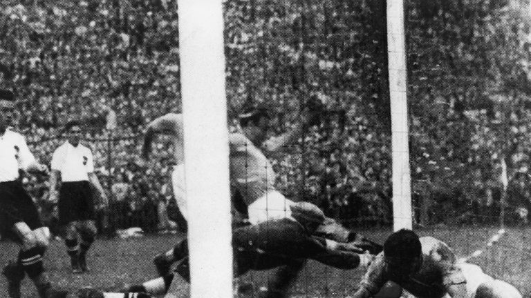 Enrico Guaita of Italy scores, ten minutes into his team's World Cup semifinal against Austria at San Siro, Milan, 3rd June 1934. Italy won the match 1-0 and went on to win the competition