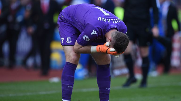 Goalkeeper Jack Butland reacts after Stoke's relegation is confirmed