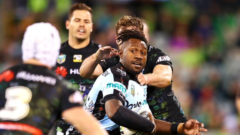 James Segeyaro of the Sharks breaks forwards in the NRL