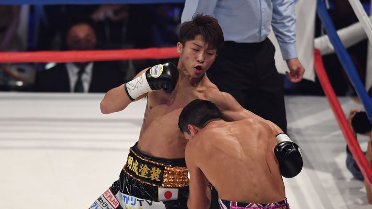 Naoya Inoue backs Jamie McDonnell up against the ropes during their WBA bantamweight title fight in Tokyo