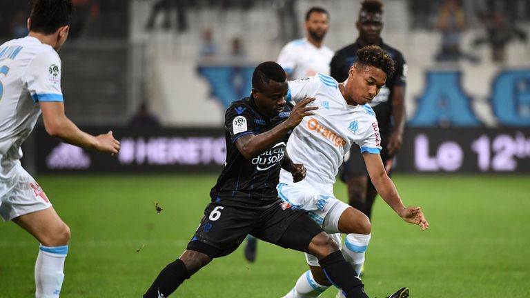 Jean Michael Seri of Nice and Boubacar Kamara of Marseille