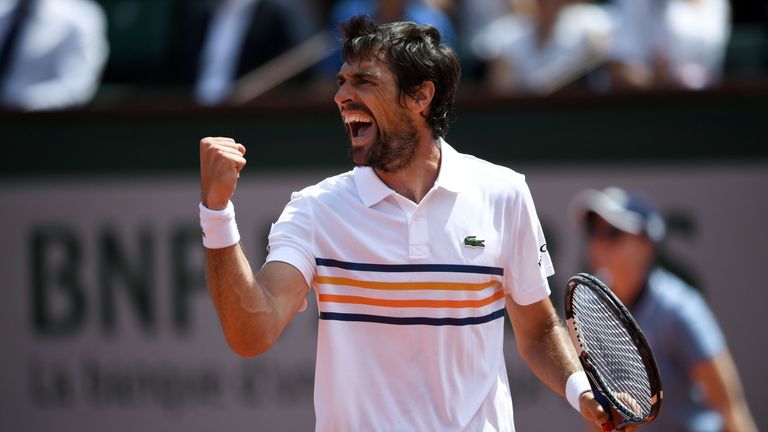 France's Jeremy Chardy celebrates after victory over Czech Republic's Tomas Berdych, at the end of their men's singles first round match on day four of The Roland Garros 2018 French Open tennis tournament in Paris on May 30, 2018. 