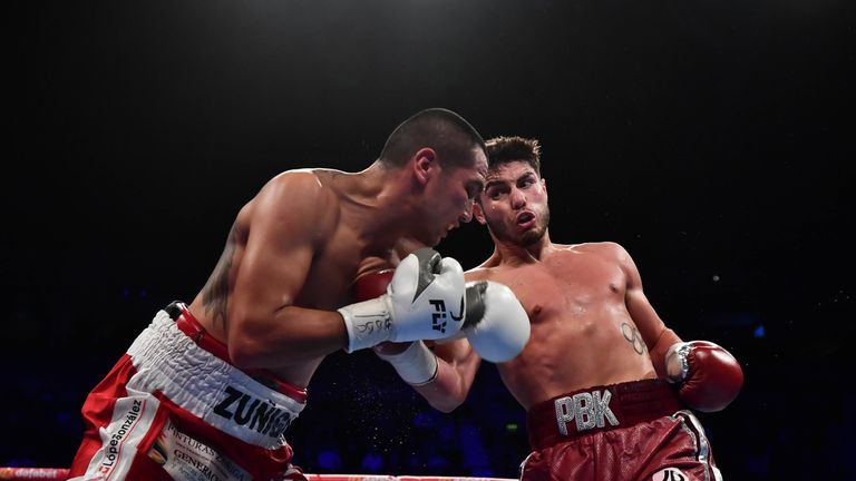 BELFAST, NORTHERN IRELAND - OCTOBER 21: Josh Kelly (R) of England and Jose Luis Zuniga (L) of Mexico during their Welterweight contest on the Burnett versus Zhakiyanov boxing bill at SSE Arena Belfast on October 21, 2017 in Belfast, Northern Ireland. (Photo by Charles McQuillan/Getty Images)