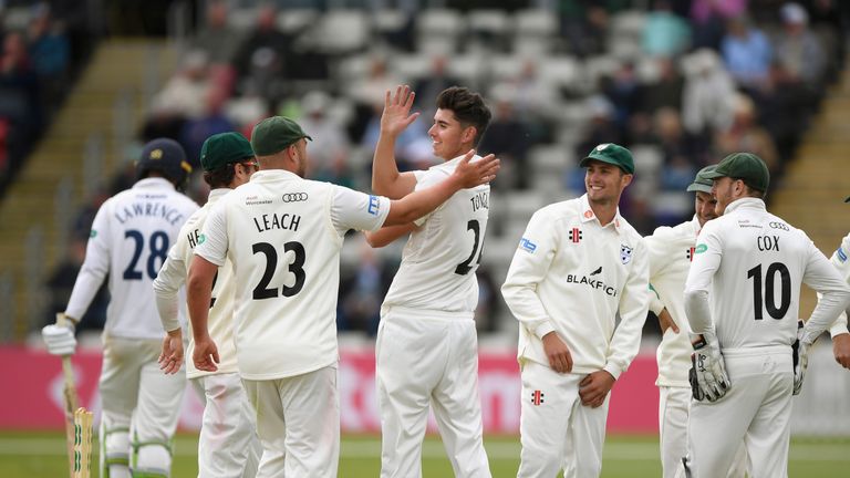 Worcestershire bowler Josh Tongue (c) is congratulated after bowling Daniel Lawrence during day one of the Specsavers County Championship Division One match between Worcestershire and Essex at New Road on May 11, 2018 in Worcester, England.  (Photo by Stu Forster/Getty Images)