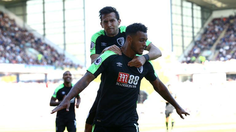 Joshua King celebrates his goal with teammate Charlie Daniels 