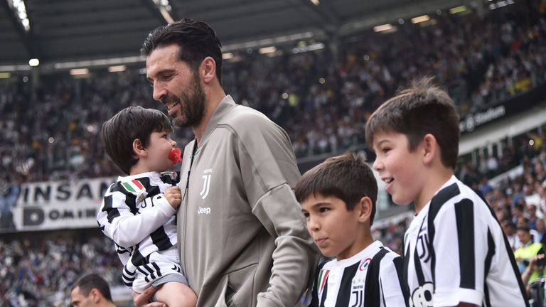 Gianluigi Buffon leads Juventus out with his three sons during his final game