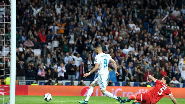 Karim Benzema scores Real Madrid's second goal during the UEFA Champions League Semi Final Second Leg match v Bayern Munich at the Bernabeu on May 1, 2018 in Madrid, Spain.