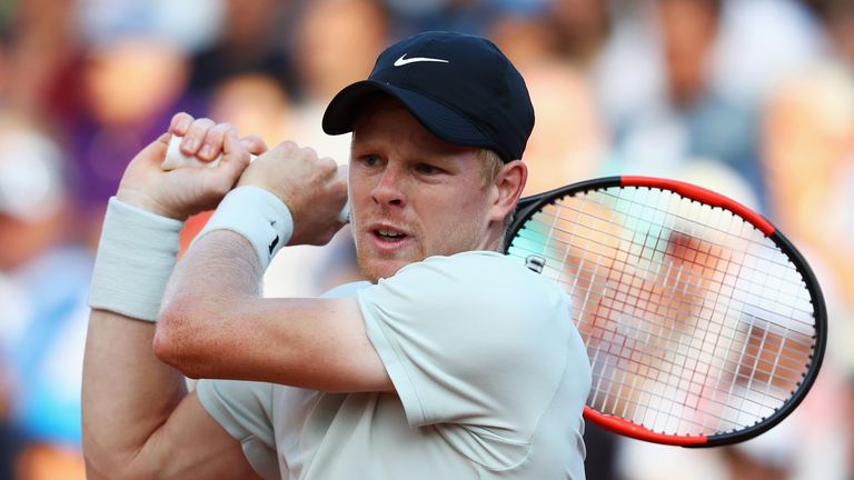 Kyle Edmund of Great Britain returns a backhand in his match against Alexander Zverev of Germany during day 5 of the Internazionali BNL d'Italia 2018 tennis at Foro Italico on May 17, 2018 in Rome, Italy.