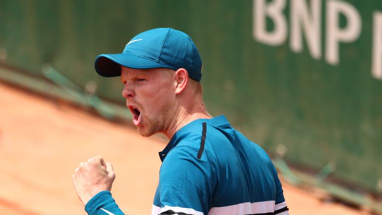 Kyle Edmund of Great Britain celebrates winning the third set during the mens singles seoncd round match against Marton Fucsovics of Hungary during day five of the 2018 French Open at Roland Garros on May 31, 2018 in Paris, France.