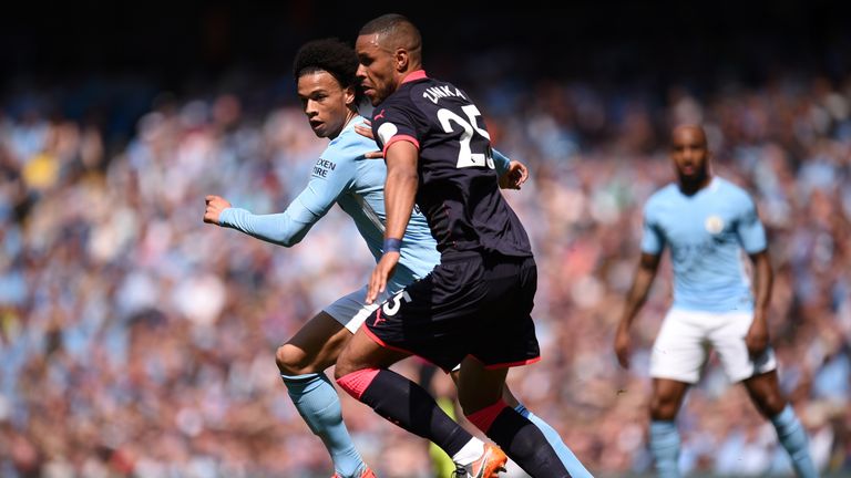 Leroy Sane and Mathias Jorgensen in action during the at the Etihad Stadium on May 6, 2018