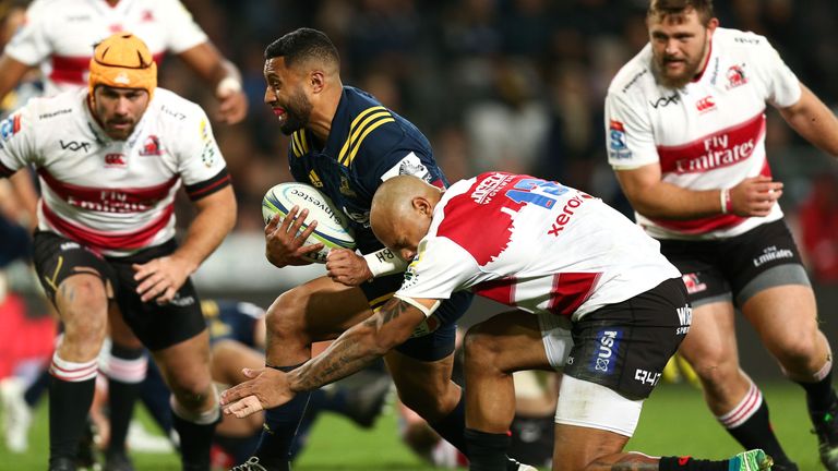 Lima Sopoaga looks to get past  Lionel Mapoe 