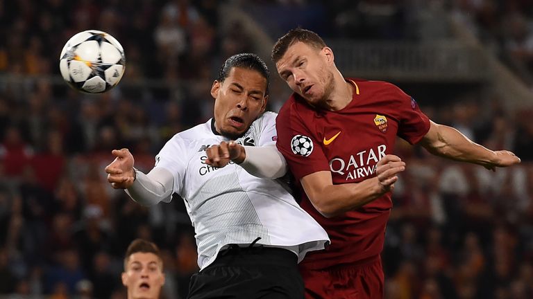 Virgil van Dijk vies with Edin Dzeko during the UEFA Champions League semi-final second leg football match between AS Roma and Liverpool at the Olympic Stadium in Rome on May 2, 2018