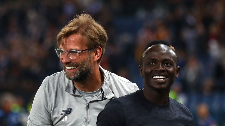 Liverpool manager Jurgen Klopp celebrates with Sadio Mane after the club secured their spot in the Champions League final