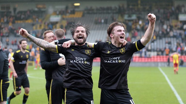 Keaghan Jacobs celebrates with Nicky Cadden as Livingston win promotion