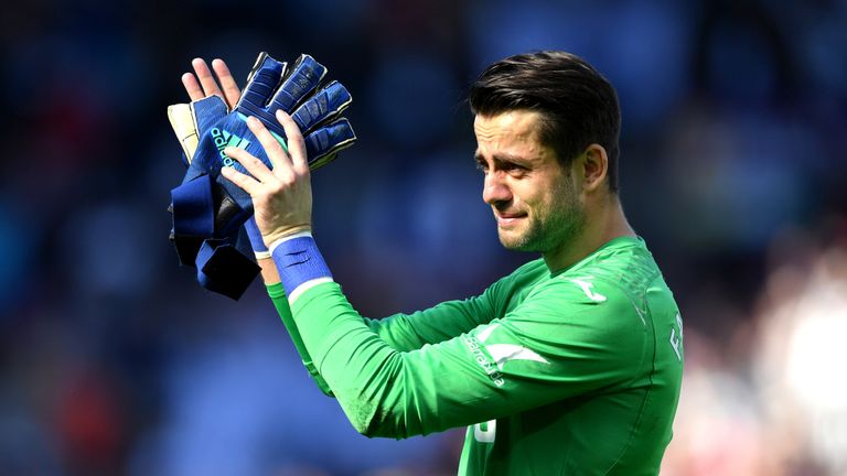 Lukasz Fabianski appears visibly upset as Swansea City are relegated from the Premier League