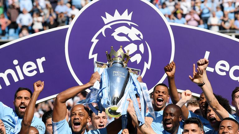 Manchester City lift the Premier League trophy