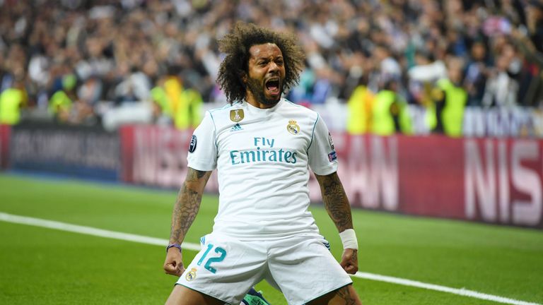Marcelo celebrates as Karim Benzema (not pictured) scores Real Madrid's first goal during the UEFA Champions League Semi-Final, Second Leg against Bayern Munich
