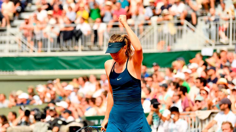 Russia's Maria Sharapova reacts after a point against Croatia's Donna Vekic during their women's singles second round match on day five of The Roland Garros 2018 French Open tennis tournament in Paris on May 31, 2018.