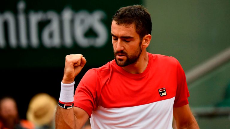 Croatia's Marin Cilic celebrates after victory over Australia's James Duckworth during their men's singles first round match on day three of The Roland Garros 2018 French Open tennis tournament in Paris on May 29, 2018.