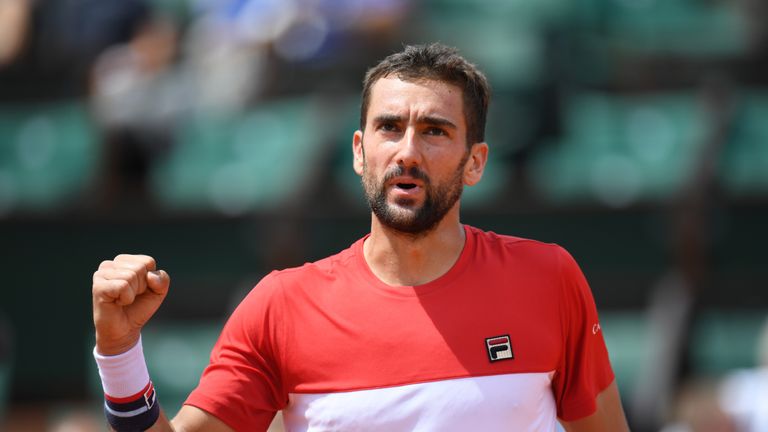 Croatia's Marin Cilic celebrates after victory Poland's Hubert Hurkacz at the end of their men's singles second round match on day five of The Roland Garros 2018 French Open tennis tournament in Paris on May 31, 2018.