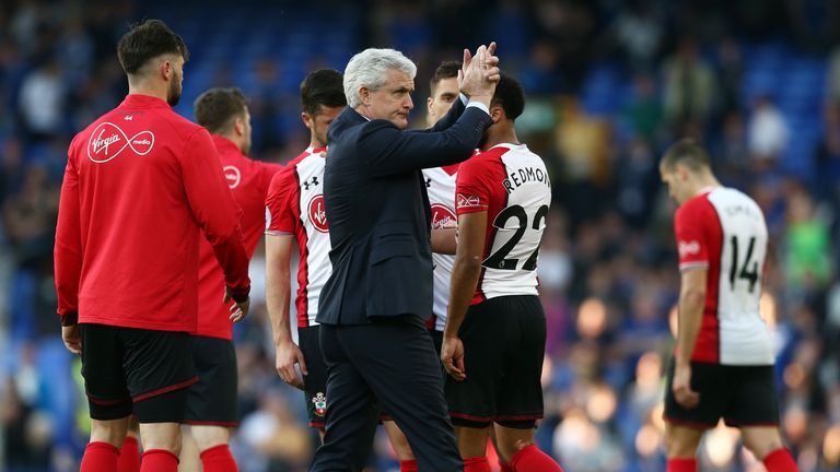 Mark Hughes applauds Southampton fans during the Premier League match between Everton and Southampton at Goodison Park on May 5, 2018 in Liverpool, England