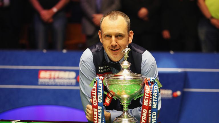 Mark Williams of Wales pose for a picture with his trophy during day seventeen of World Snooker Championship after winning the tournament at Crucible Theatre on May 7, 2018 in Sheffield, England
