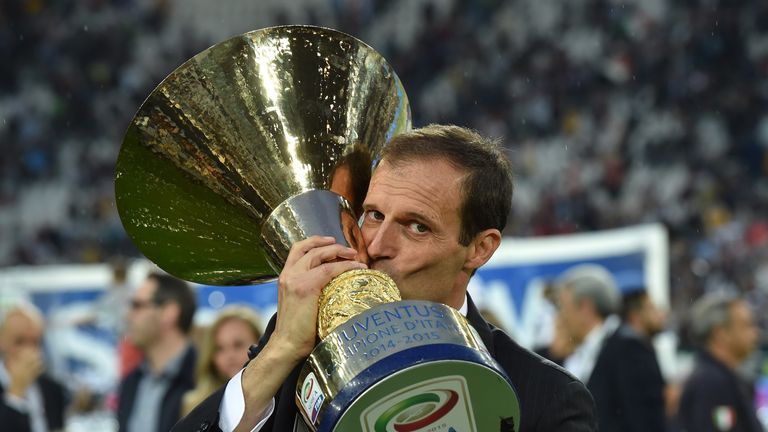Massimiliano Allegri celebrates with the Serie A trophy in 2015