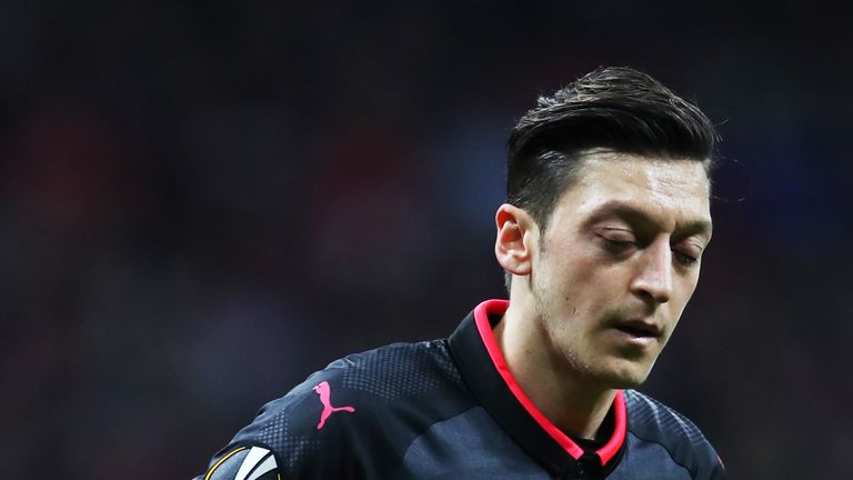 Mesut Ozil cut a frustrated figure as Arsenal were knocked out of the Europa League on Thursday