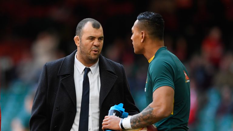 Michael Cheika the head coach of Australia speaks with Israel Folau of Australia prior to kickoff during the international match between Wales and Australia at the Principality Stadium on November 5, 2016 in Cardiff, Wales