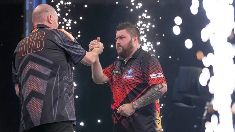 Thursday’s Unibet Premier League game at The BHGE Arena in Aberdeen between Michael Smith and Raymond van Barneveld.
