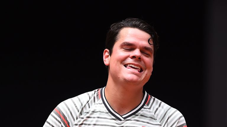 Milos Raonic of Canada smiles after winning a point against Nicolas Kicker of Argentina in their 1st Round during day three of the Mutua Madrid Open tennis tournament at the Caja Magica on May 7, 2018 in Madrid, Spain