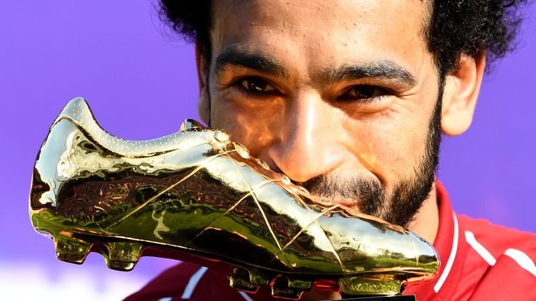 Mohamed Salah poses with his Premier League Golden Boot Award after the Premier League match against Brighton