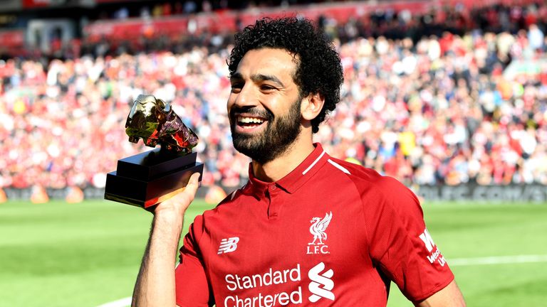 Mohamed Salah poses with his Premier League Golden Boot Award after the Premier League match against Brighton