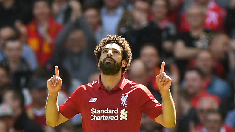 Mohamed Salah celebrates scoring against Brighton