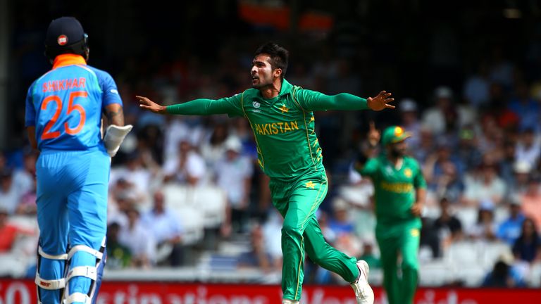 Mohammad Amir of Pakistan celebrates after taking the wicket of India's Shikhar Dhawan