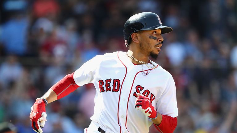Mookie Betts #50 of the Boston Red Sox runs the bases after hitting a solo home run during the seventh inning against the Kansas City Royals at Fenway Park on May 2, 2018 in Boston, Massachusetts. (Photo by Tim Bradbury/Getty Images)