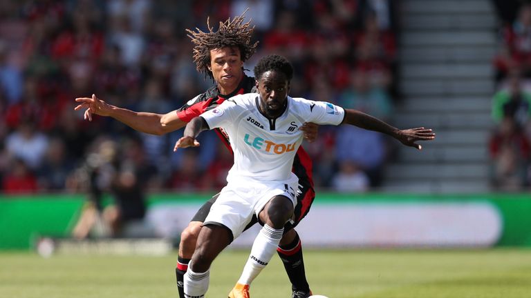 Nathan Dyer and Nathan Ake battle for the ball during Bournemouth vs Swansea