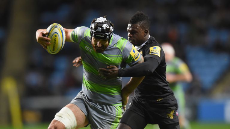 xxx of Wasps is tackled by xxxx of Newcastle Falcons during the Aviva Premiership match between Wasps and Newcastle Falcons at The Ricoh Arena on November 18, 2017 in Coventry, England.