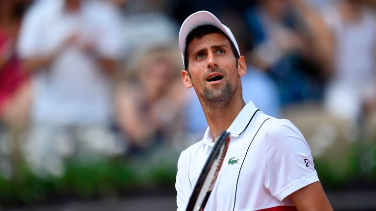 Serbia's Novak Djokovic looks on between points against Spain's Jaume Munar during their men's singles second round match on day four of The Roland Garros 2018 French Open tennis tournament in Paris on May 30, 2018. 