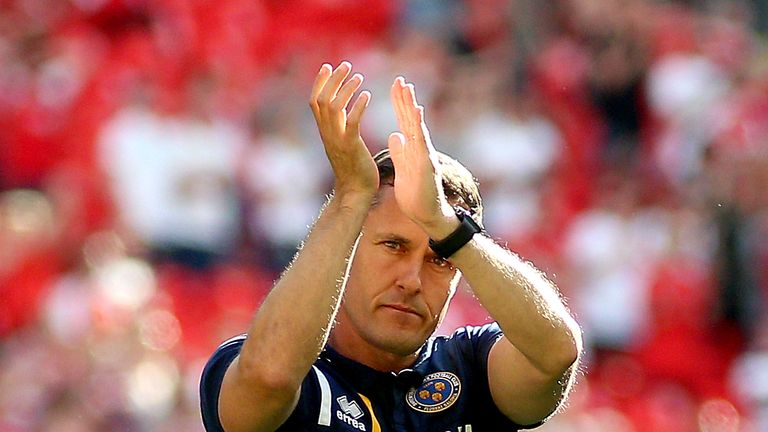 Shrewsbury Town manager Paul Hurst acknowledges the fans after the final whistle during the Sky Bet League One Final at Wembley Stadium, London. PRESS ASSOCIATION Photo. Picture date: Sunday May 27, 2018. See PA story SOCCER League One. Photo credit should read: Nigel French/PA Wire. RESTRICTIONS: EDITORIAL USE ONLY No use with unauthorised audio, video, data, fixture lists, club/league logos or "live" services. Online in-match use limited to 75 images, no video emulation. No use in betting, games or single club/league/player publications.