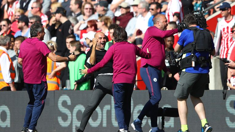 Pep Guardiola reacts to Gabriel Jesus' late winner with Man City's backroom staff